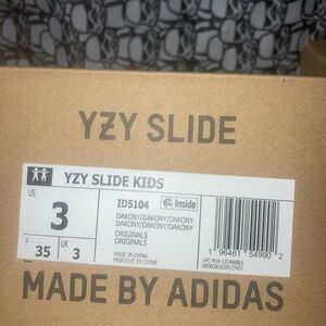 Yeezy Adidas slides black.